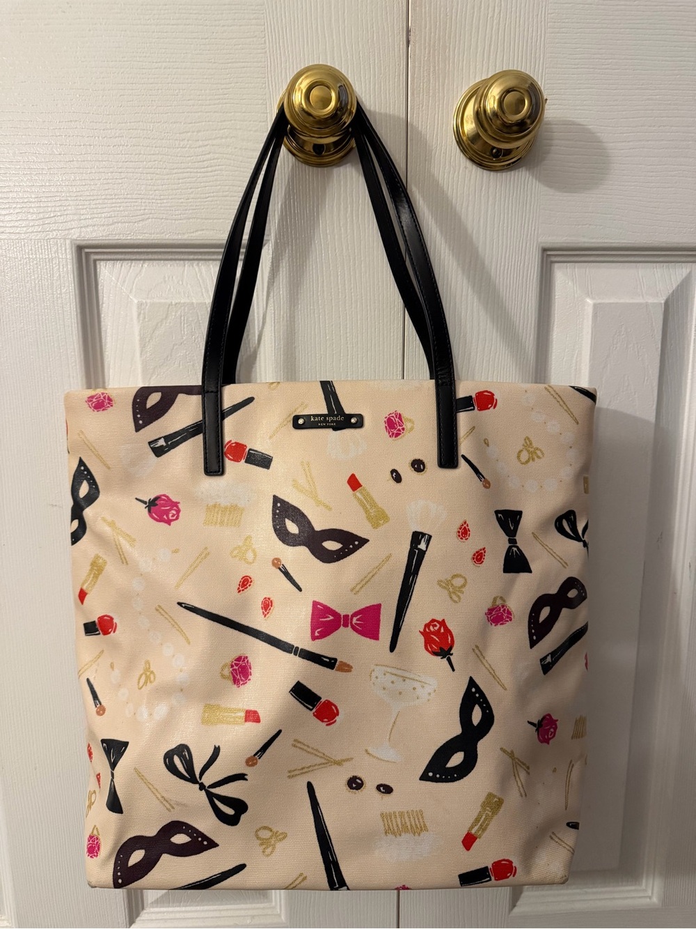 kate spade Beige Cosmetic & Mask Print Tote with Black Handles